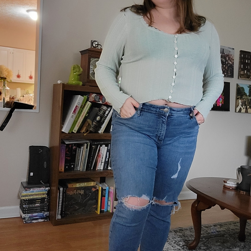 Green sweater crop